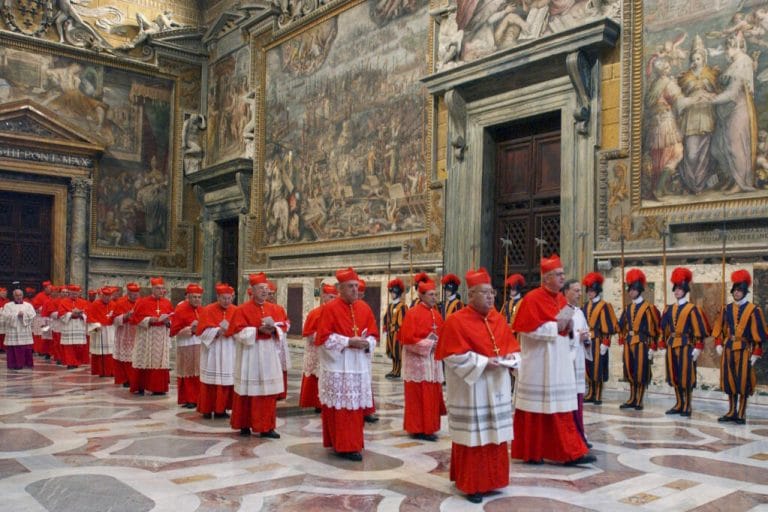 Cardinals walk in procession to the Sistine Chapel at the Vatican, at the beginning of the conclave.